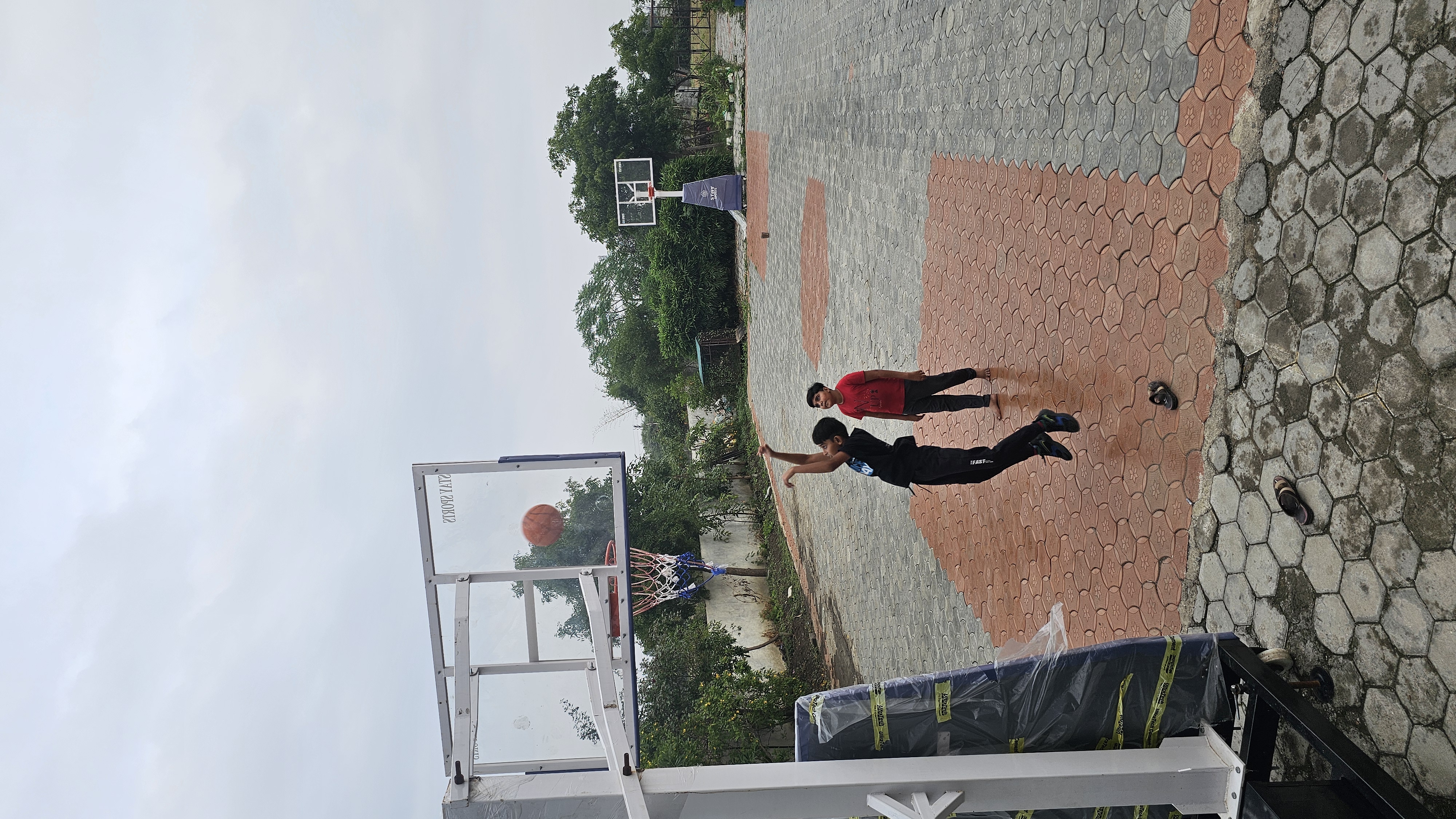 Students using sports facilities at Holy Angel's Kids Academy